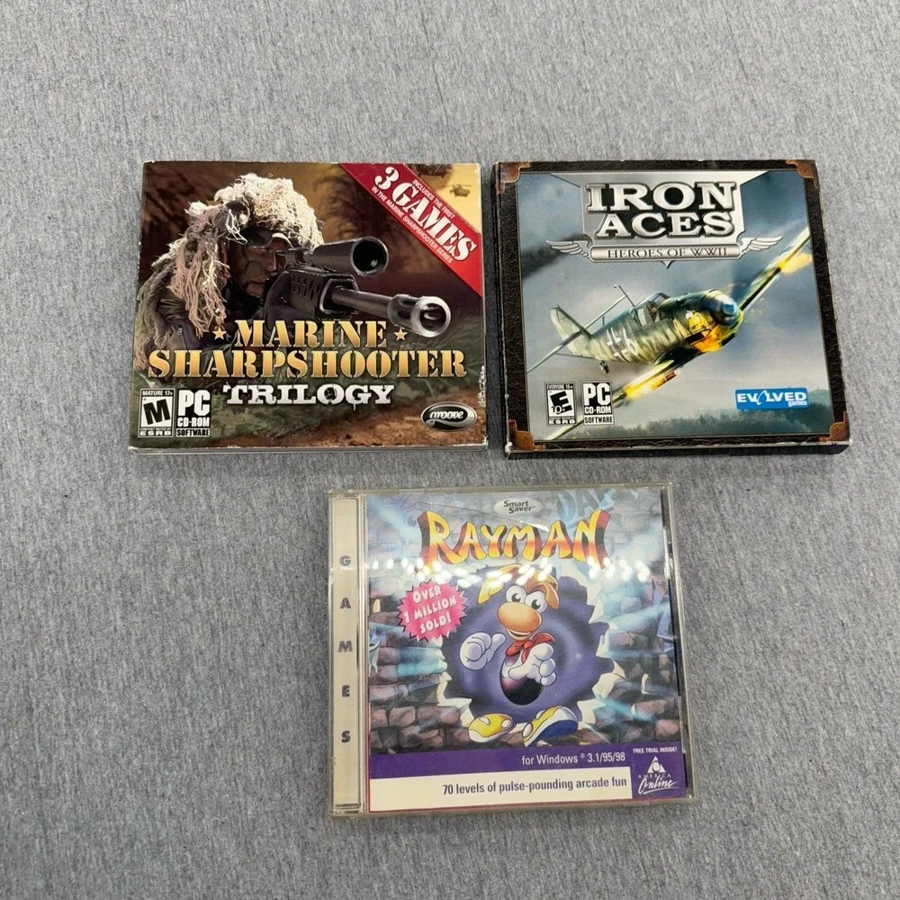 Lot Of 7 PC Games:  Battlefield 2, Flight Simulator, Rayman, Iron Aces, etc.